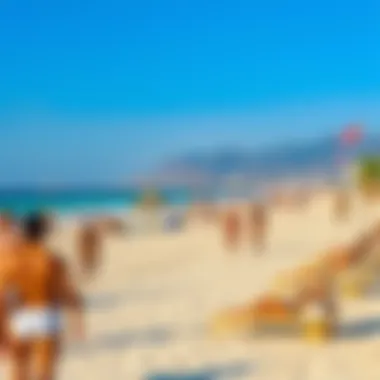 Visitors enjoying various recreational activities such as beach volleyball and sunbathing at Alzora Beach.