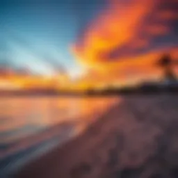 A breathtaking view of Alzora Beach at sunset, showcasing the vibrant sky and tranquil waters.