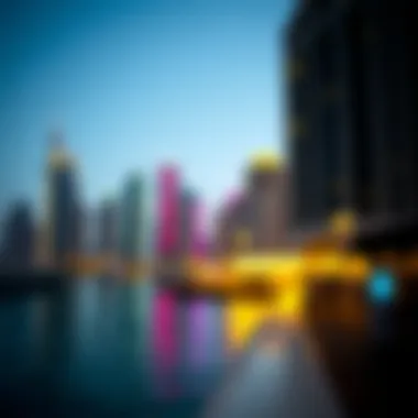 The vibrant colors of the Dubai Marina skyline reflecting in the water at night.