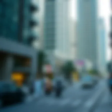 A bustling street scene at the base of X3 Tower, illustrating its vibrant location