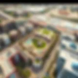 Aerial view of Town Square Dubai showcasing its layout and green spaces